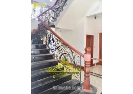 Cầu thang sắt uốn hoa văn mỹ thuật
